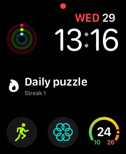 An Apple Watch face showing the ScrollChess complication with the daily puzzle and a streak