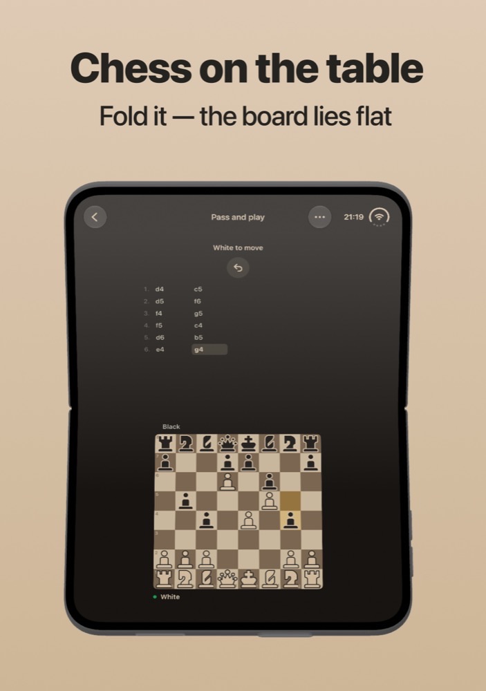 Chess on the table: the inner screen of an iPhone Duo with the move list on the upper half and the board on the lower half